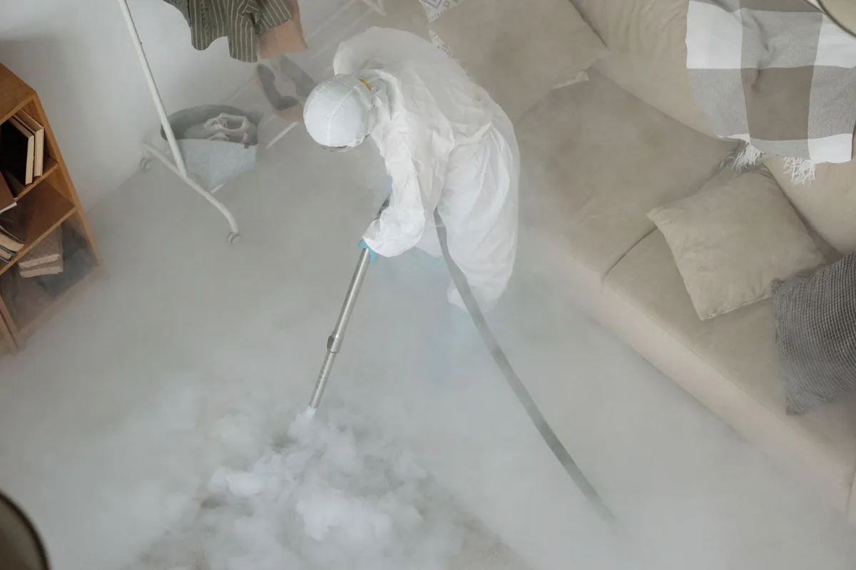 Biohazard cleanup technician in protective equipment, North Linden, Columbus, OH